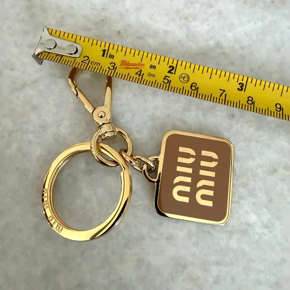 Miu‎ Miu 5PS066 Metal Key holder Key Chain Logo, gold and caramel in box